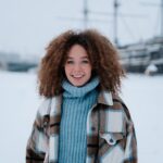 girl with natural hair in the winter