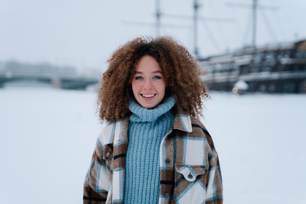 girl with natural hair in the winter