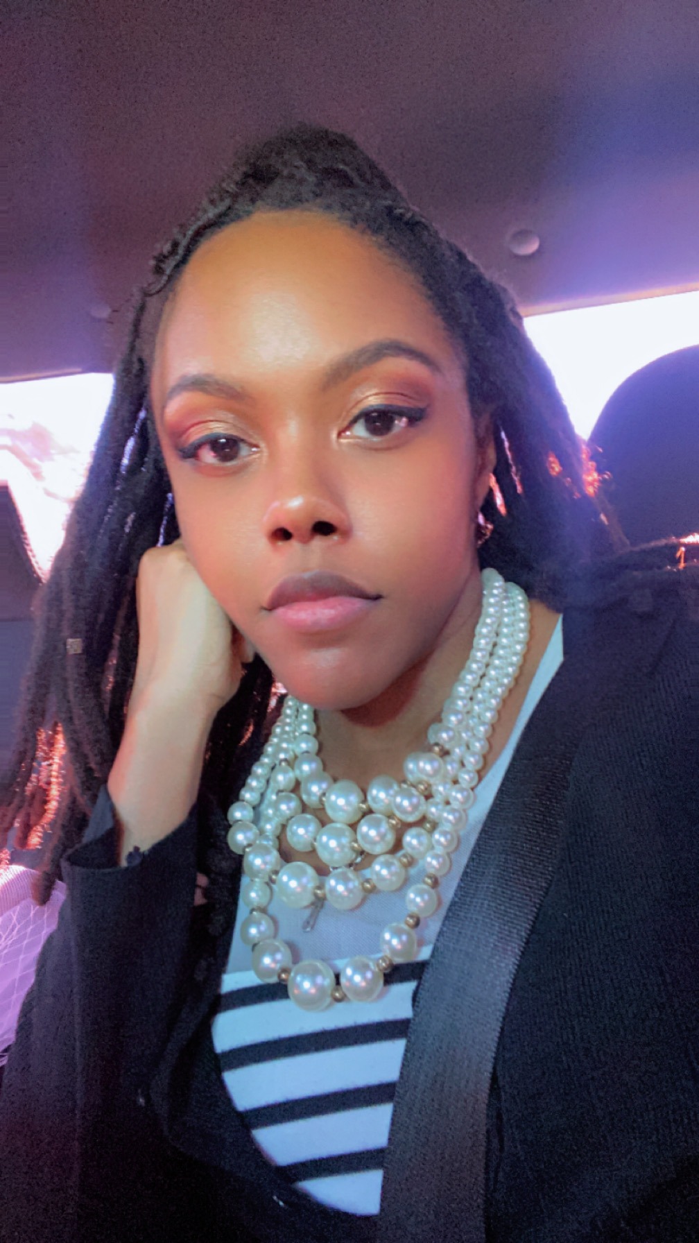 Girl With Locs and Pearls