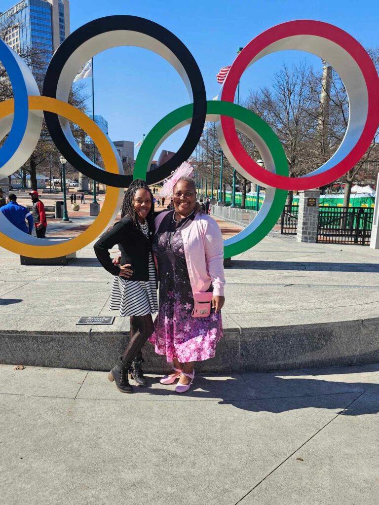 the Olympic sign in atlanta ga, girls dressed up for a tea party