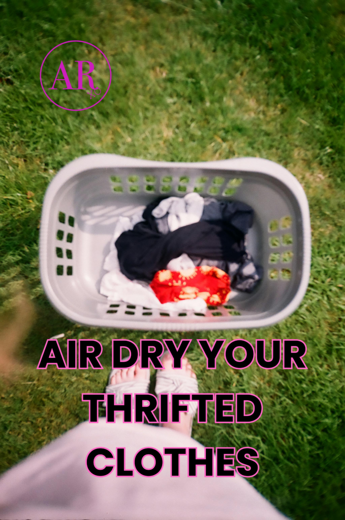 a white laundry basket of wet thrifted clothes to be air dried outside